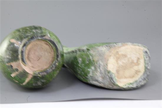 Two Chinese green-glazed flasks, possibly Liao dynasty, 26.5cm and 29.5cm